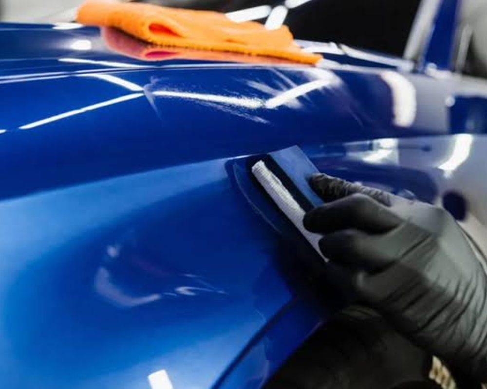 Ceramic coating being levelled on a car's paintwork